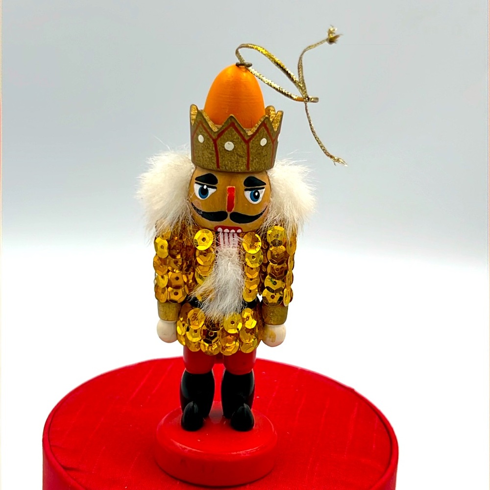 Pottery Barn wooden nutcracker furry hair sequin jacket hand painted mouth opens